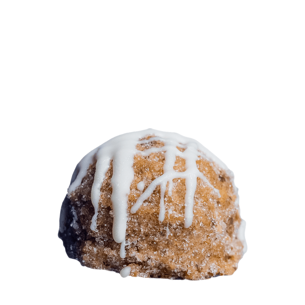 “Close up of Sassy Balls protein energy bite Cinful Buns flavor snack ball with cinnamon bun texture and white icing drizzle”