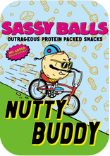 Load image into Gallery viewer, Product packaging for 'Sassy Balls' with a cartoon character on a bike against a colorful background.