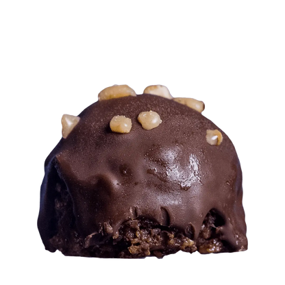 Double-F Heath Bar Brownie Energy Bites close-up with chocolate coating and crunchy toffee chunks on top